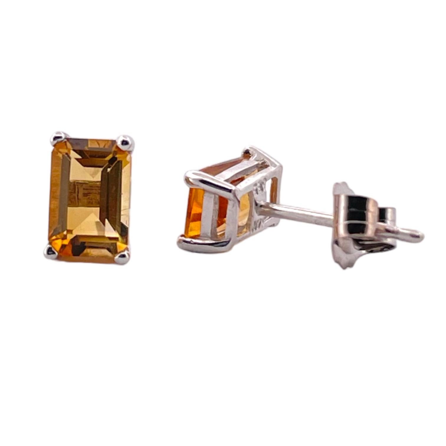 Illuminate your look with the Radiant Elegance Rectangular Citrine Stud Earrings, expertly crafted in sleek 14K white gold. Weighing a delicate 0.73 grams, these earrings present a pair of beautifully faceted, rectangular citrine gemstones, each one