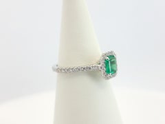 Radiant Emerald and Diamonds Halo Engagement Ring