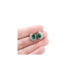 Pendientes Esmeralda Radiante y Diamante en Oro Blanco de 14k