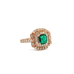 Radiant Emerald & Diamond Halo Ring in 14k Rose Gold