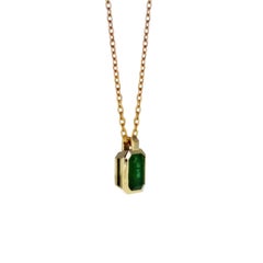 Radiant Emerald Gold Pendant