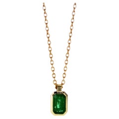 Radiant Emerald Gold Pendant