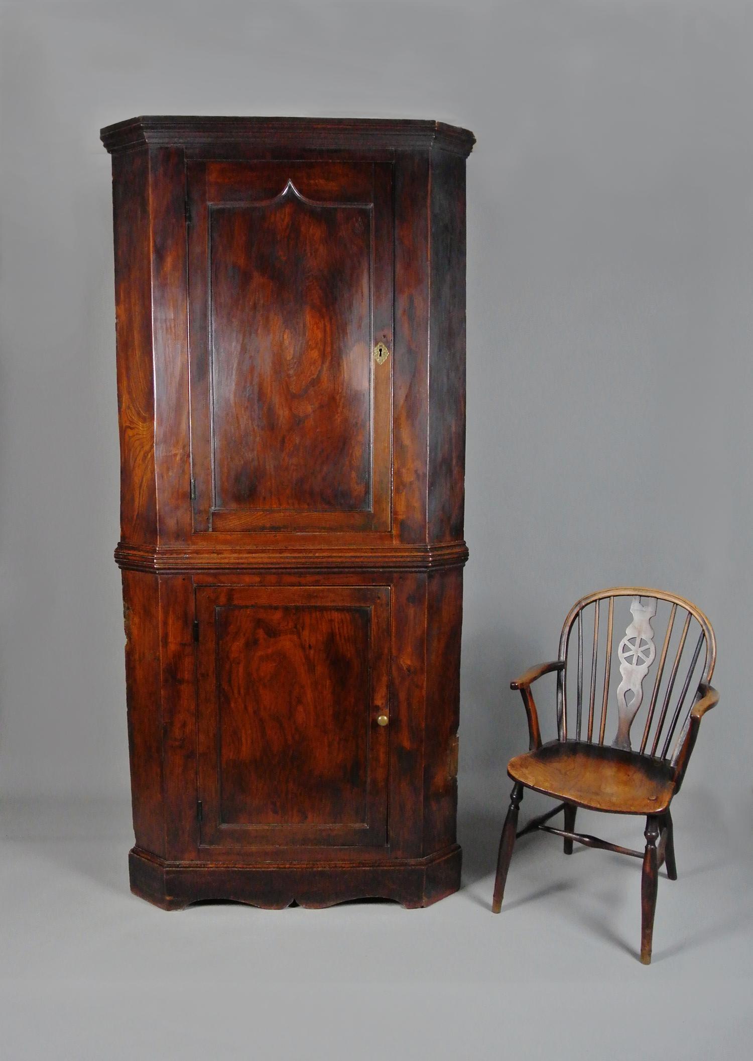 A very beautiful elm corner cupboard made by skilled hands in c. 1800 and retaining all original timbers including original shaped shelves and hand hewn backboards.

Fabulous well developed colour and patination to the elm, beautiful natural grain. 