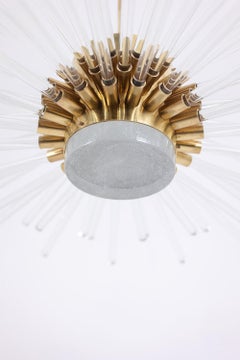 Radiant glass tube chandelier. Contemporary design.