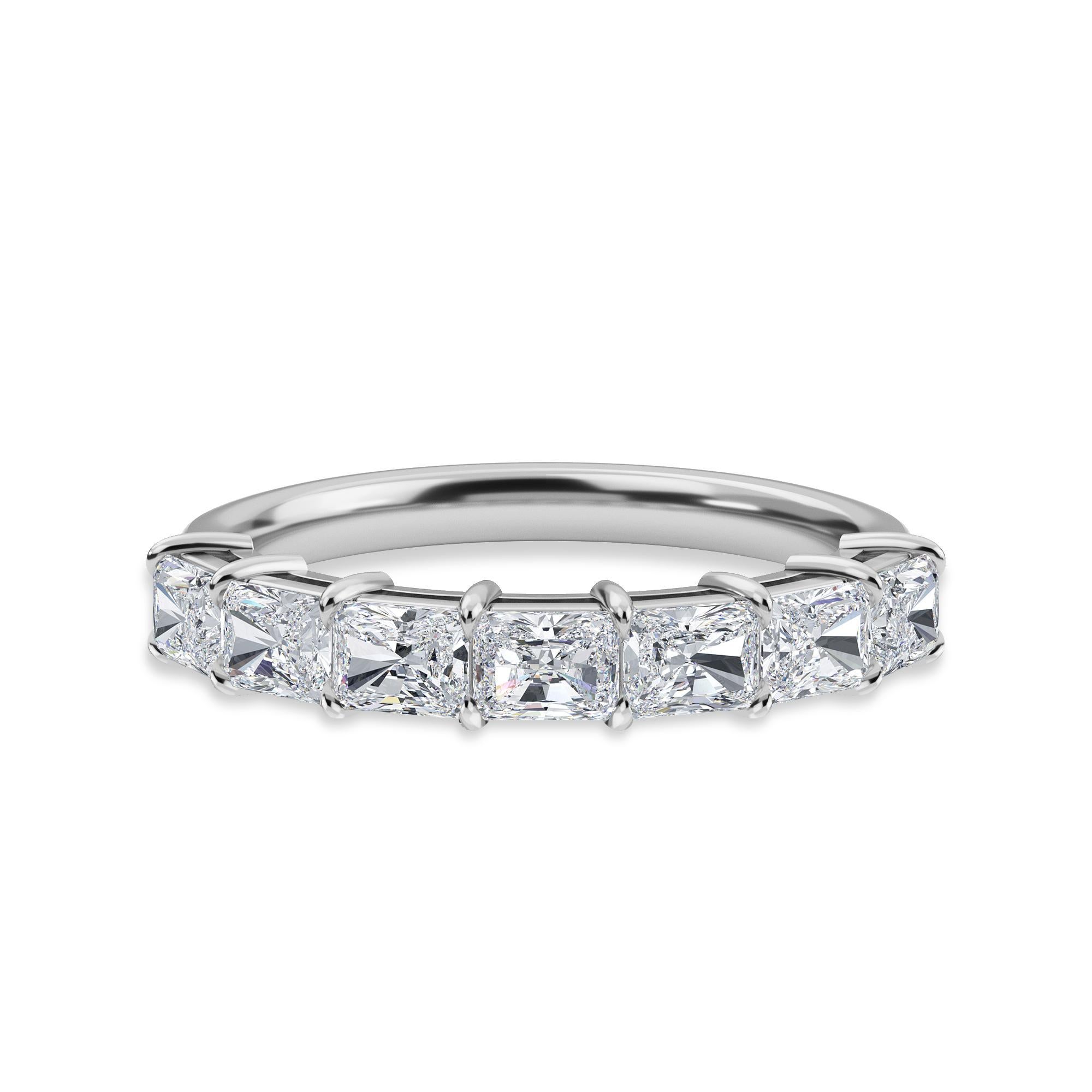 This Partway Band features 7 Radiant Diamonds, set Horizontally, with a Total Carat Weight of 1.19. The Diamonds are F Color, VS Clarity.
The ring is a finger size 6.5 and is set in Platinum.