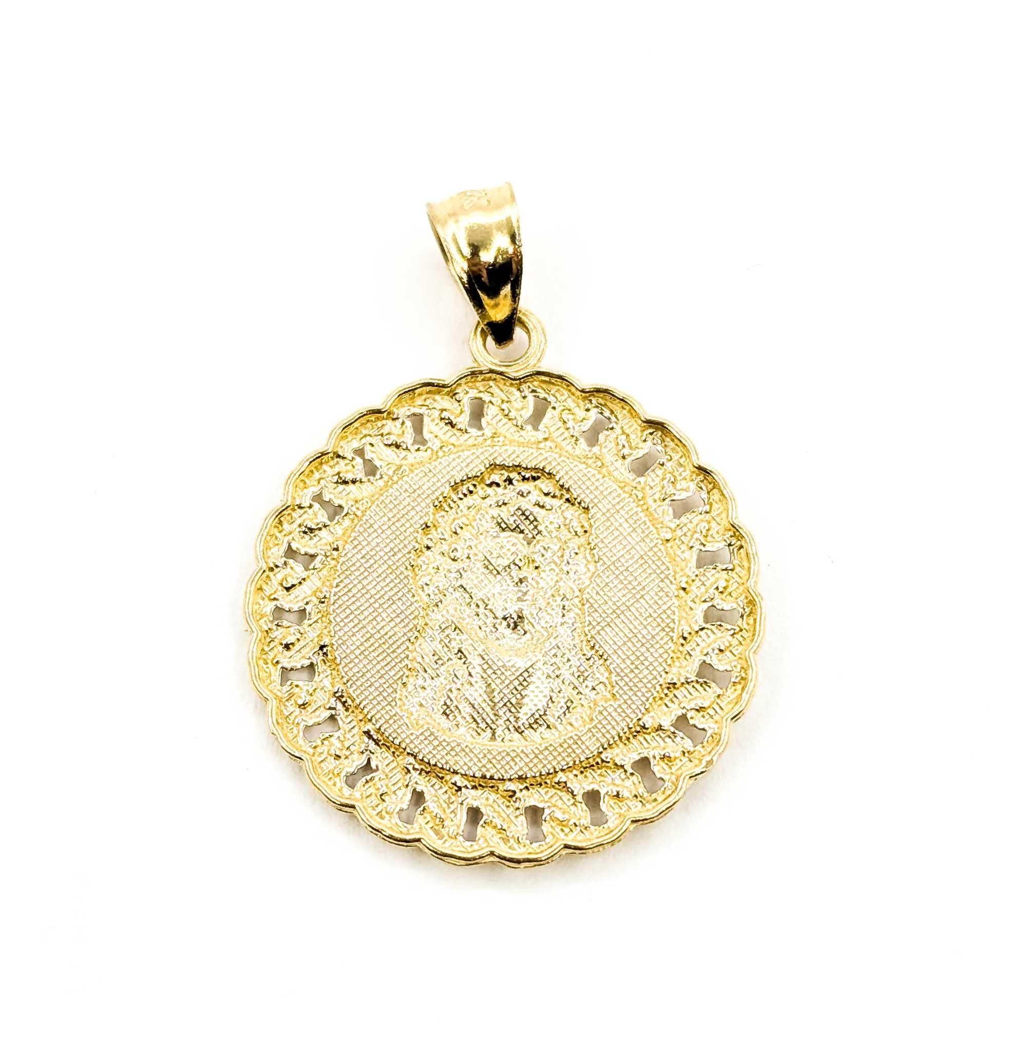 Pendentif Médaillon Jésus rayonnant en or jaune 10k en vente 1
