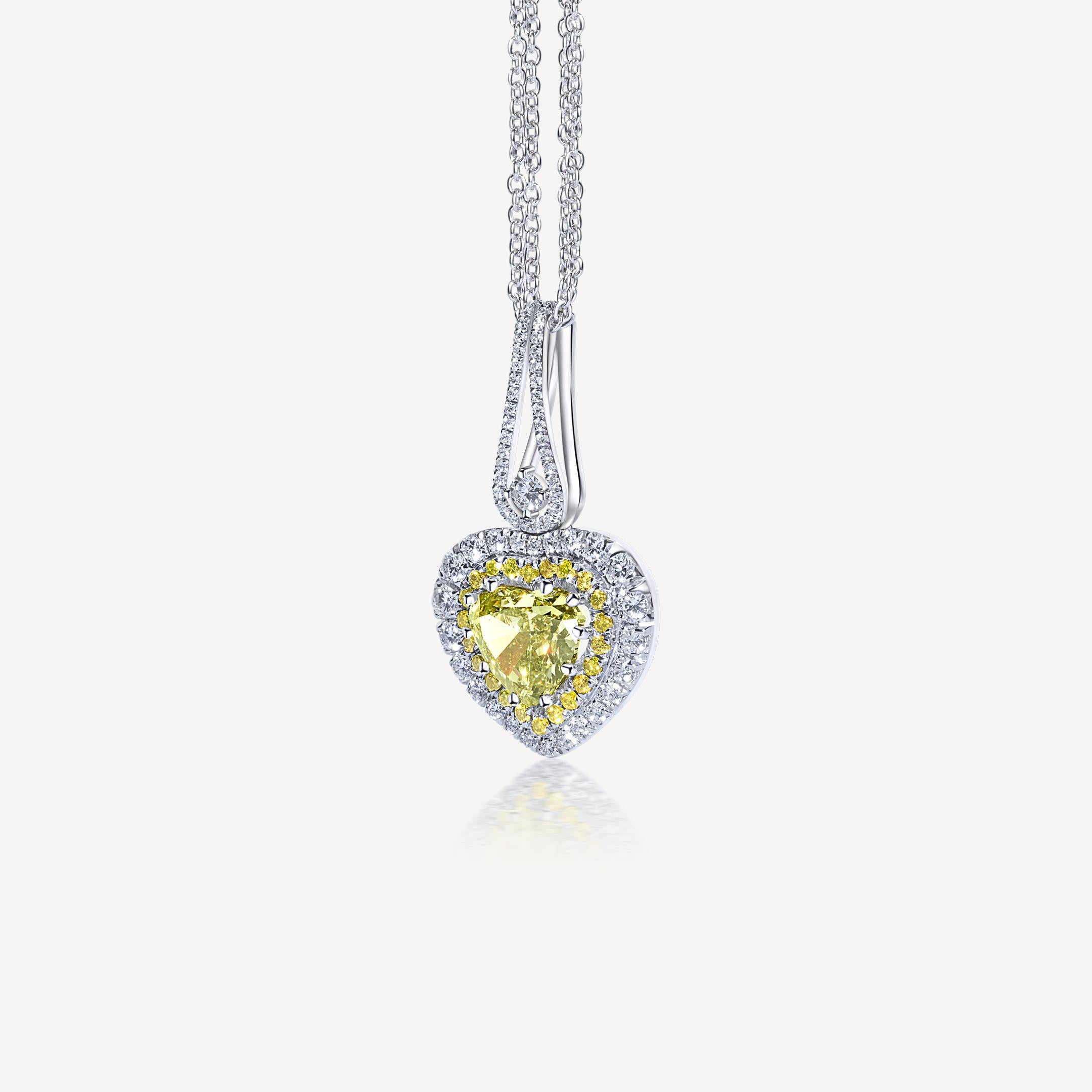 Necklace in white gold 18Kt 16.61 gr with Heart Shape Diamond Fancy Deep Brownish Greenish Yellow VVS2 Clarity 4.02 ct and Round Diamonds Fancy Yellow and G color VS clarity in total 1.95 ct
This anniversary collection represents a tribute to the