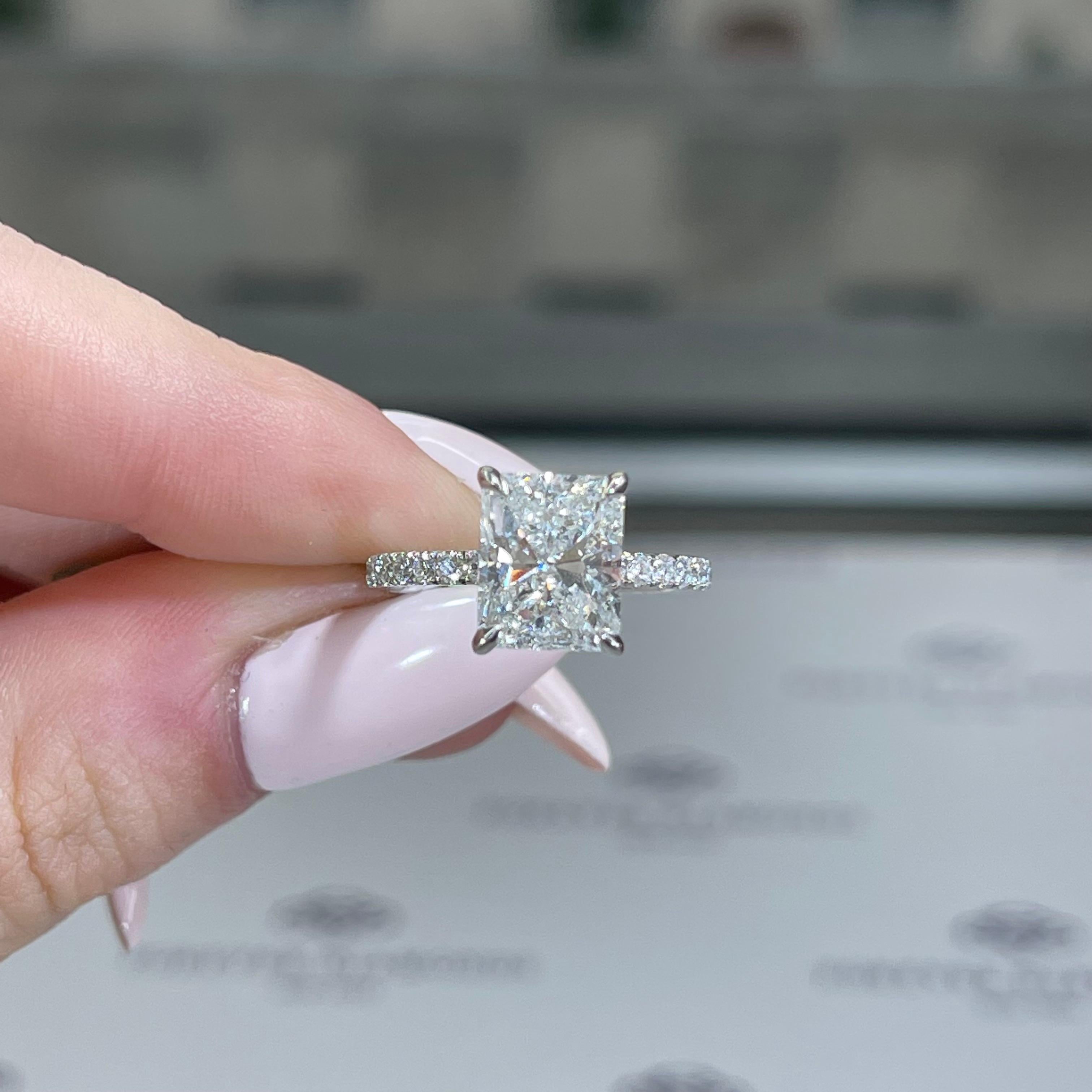 Delicate, yet strong-- The Madison was created for the woman who knows that there is often more to beauty than meets the eye. Breathing new life into the popular pavé solitaire setting, The Madison incorporates a hidden halo and pavé prongs over a