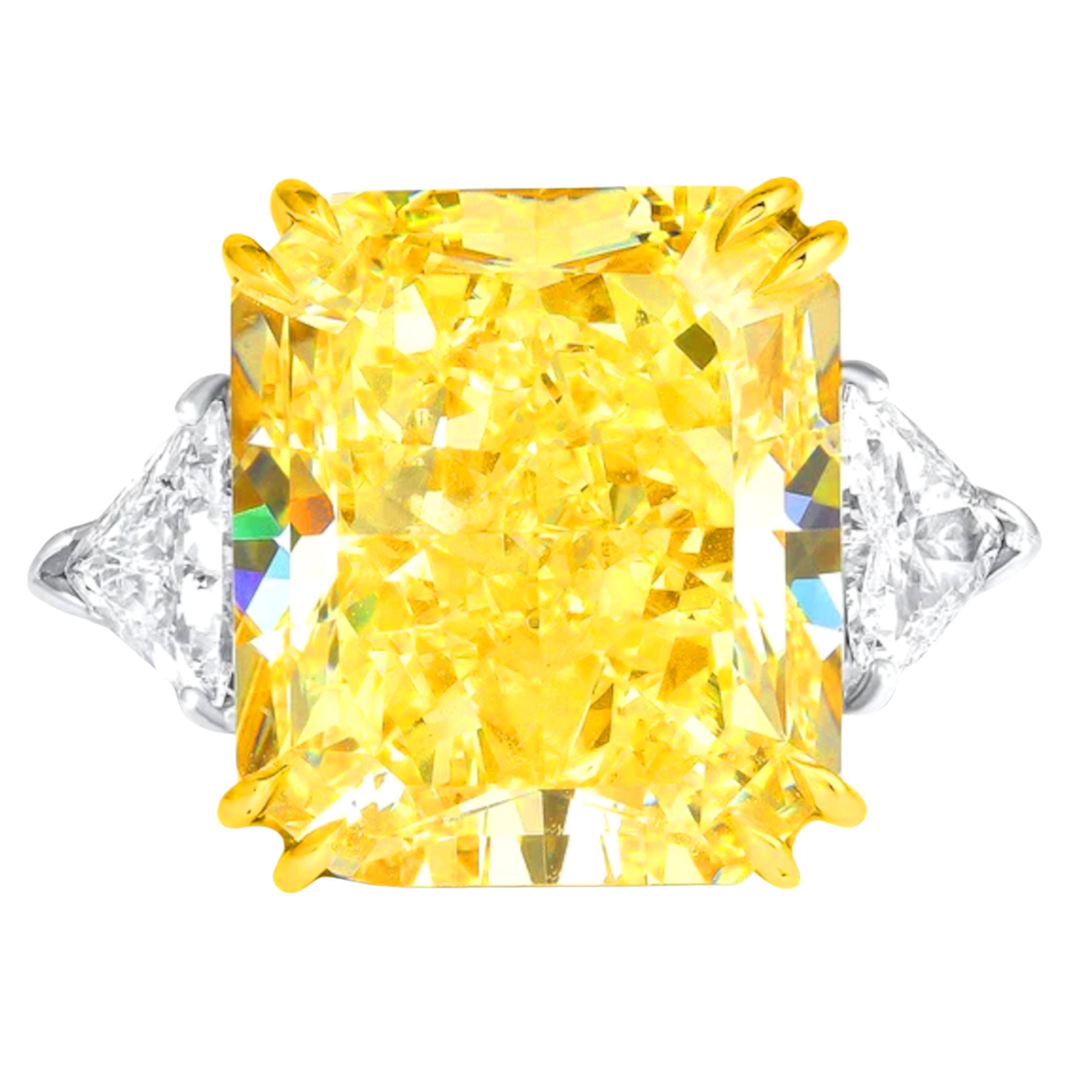 Radiant Masterpiece 5.37 carat Fancy Intense Yellow Radiant Cut Diamond Ring