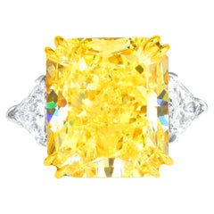 Radiant Masterpiece 5.37 carat Fancy Intense Yellow Radiant Cut Diamond Ring
