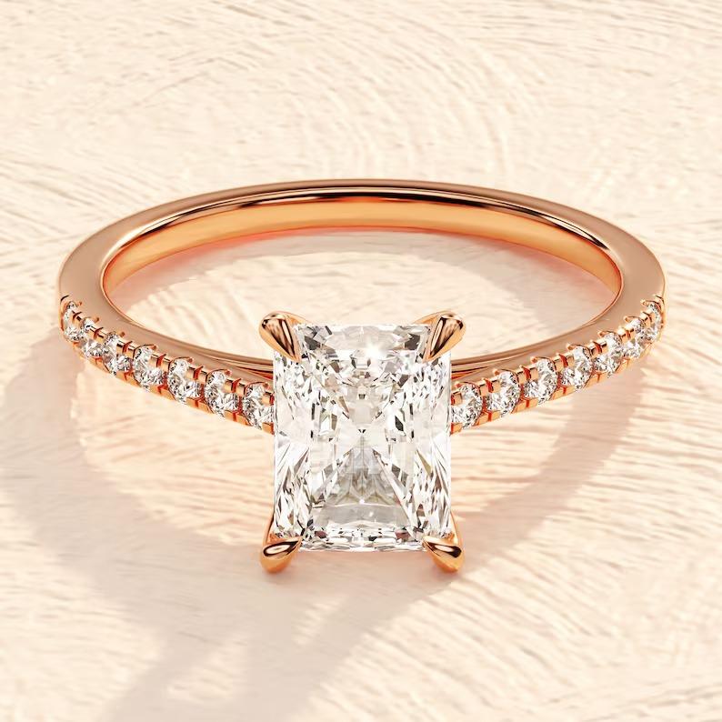 1.5ct Radiant Moissanite Engagement Ring 925 Sterling Silver Ring Gift for Her.

Gemstone: Moissanite
Moissanite Size: 6x8 mm Approx.
Moissanite Clarity: VVS1 Clarity.
Moissanite Color: D Color (Colorless).
Style: Minimalist
Base Metal : 925