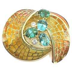 Broche de turmalina en mosaico radiante