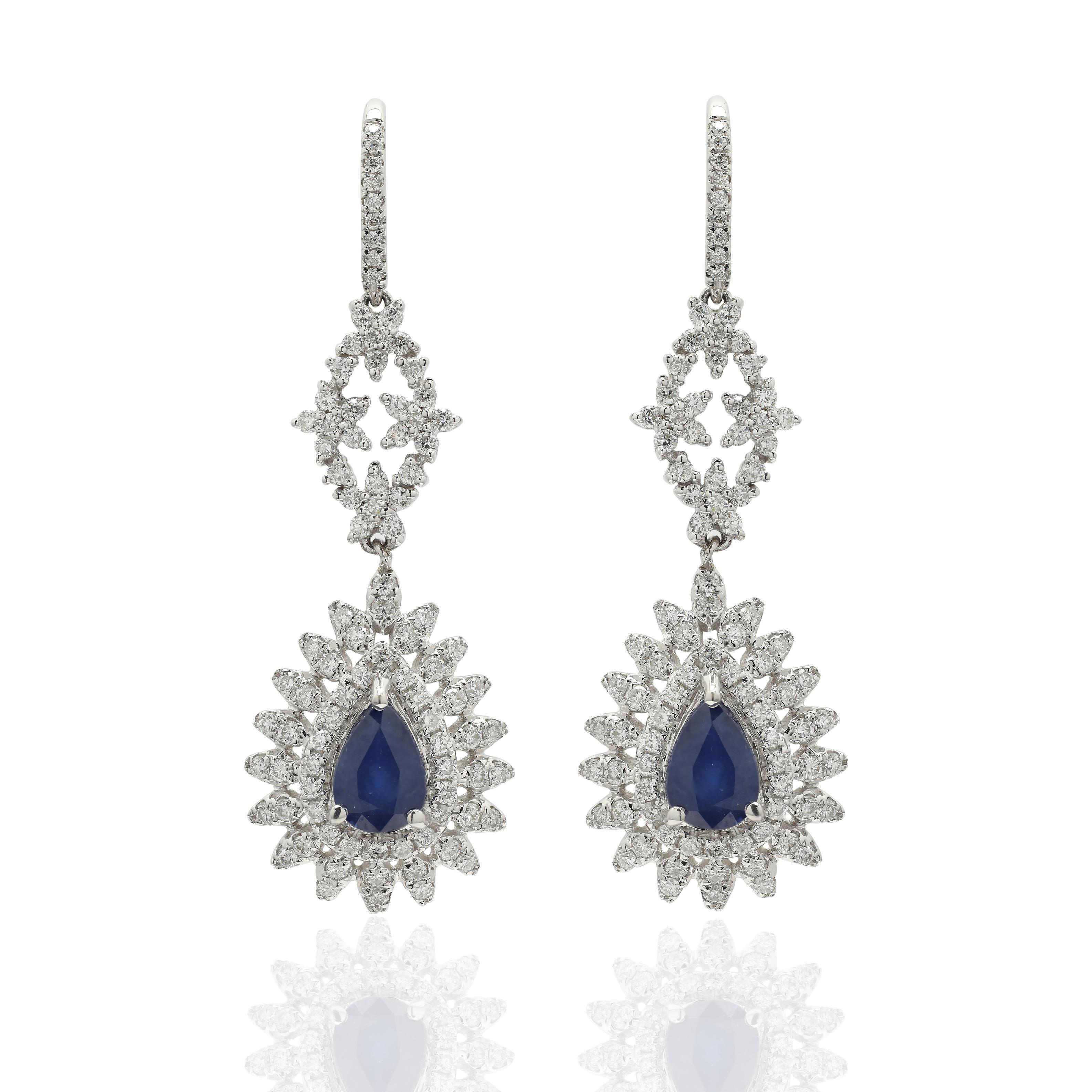 Blue Sapphire and Diamond Dangle Earrings to make a statement with your look. These earrings create a sparkling, luxurious look featuring pear cut gemstone.
If you love to gravitate towards unique styles, this piece of jewelry is perfect for