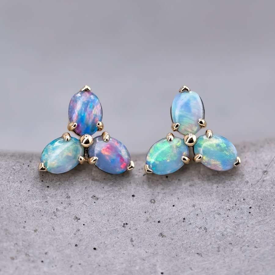 Radiant Rainbow Hues Australian Doublet Opal Trio Stud Earrings in 14K Yellow Gold.


Free Domestic USPS First Class Shipping!  Free One Year Limited Warranty!  Free Gift Bag or Box with every order!



Opal—the queen of gemstones, is one of the