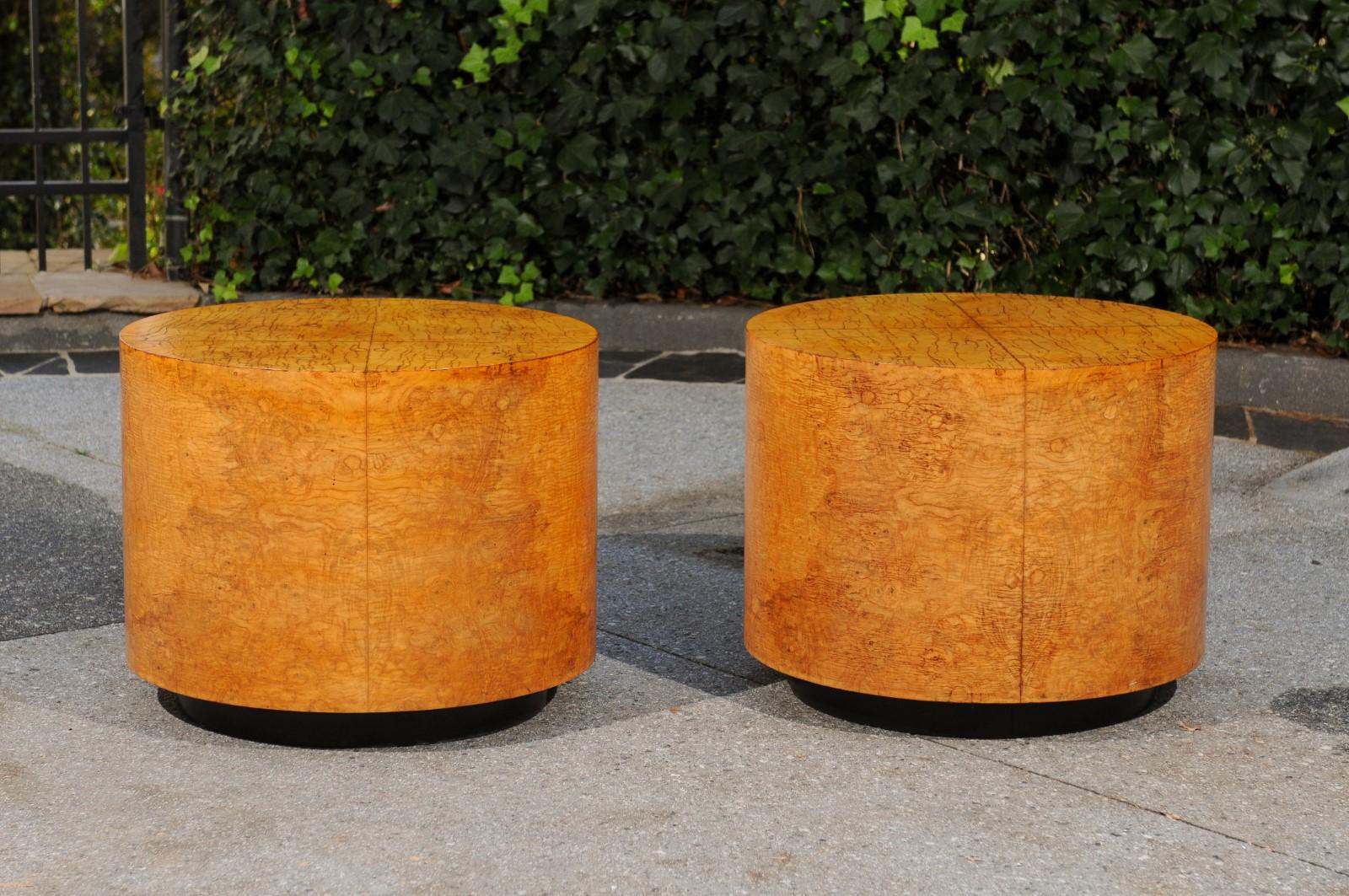 These magnificent tables are shipped as professionally photographed and described in the listing narrative: Meticulously professionally restored and completely installation ready.

A beautiful pair of large scale cylinder tables, circa 1975. Stout