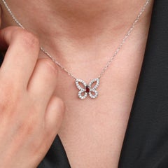 Radiant Ruby Butterfly, a Stunning Diamond-Accented Pendant Necklace