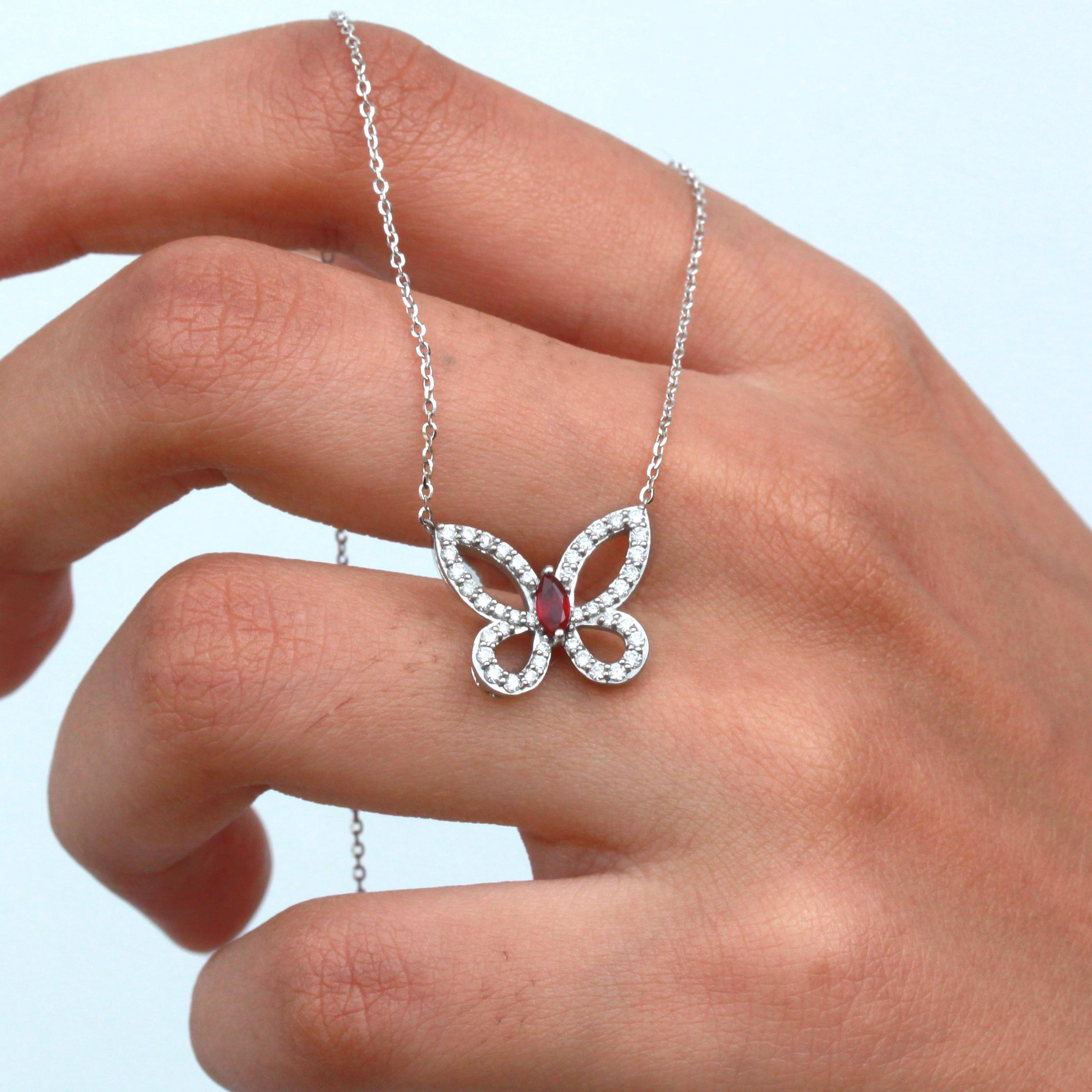 Mixed Cut Radiant Ruby Butterfly, a Stunning Diamond-Accented Pendant Necklace For Sale