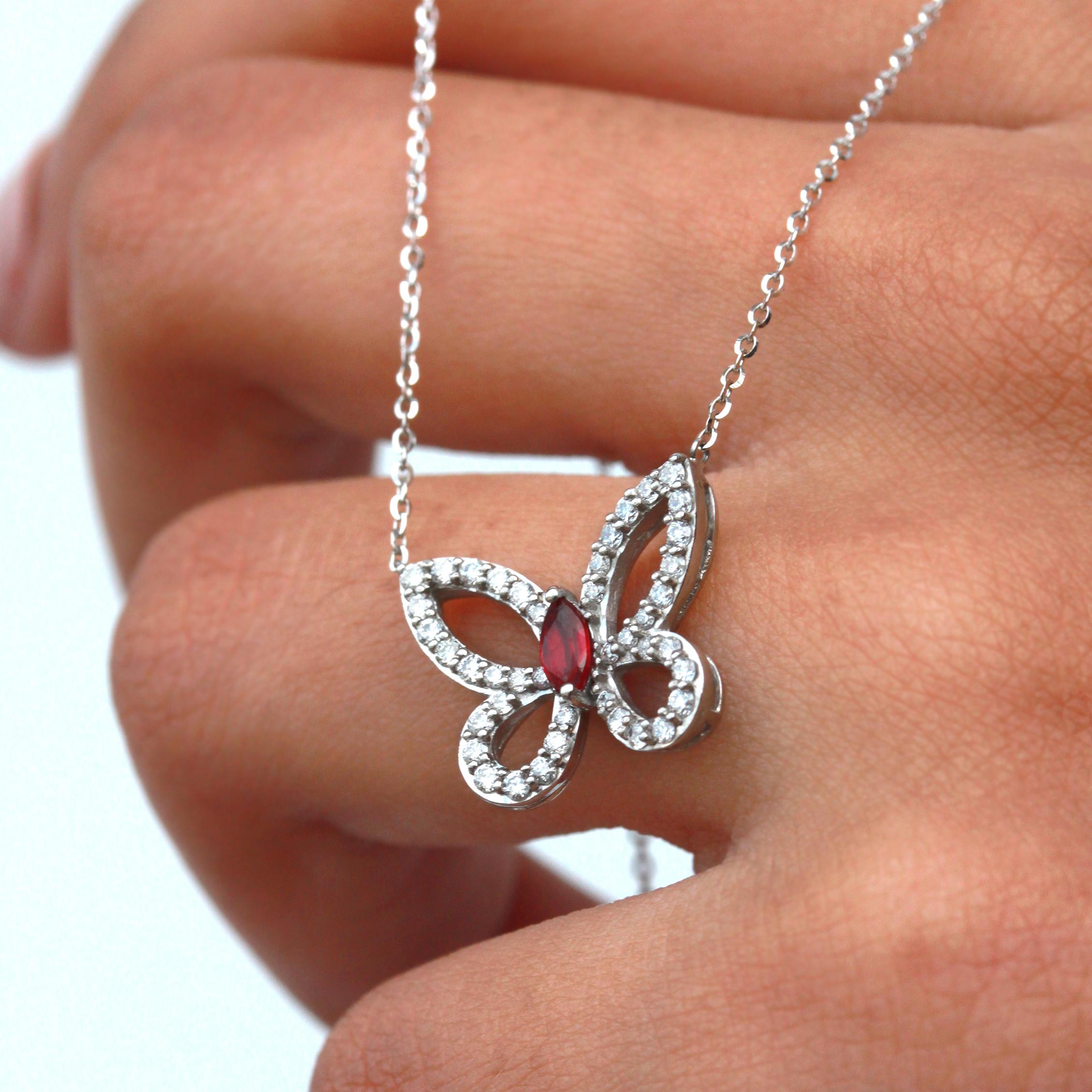 Radiant Ruby Butterfly, a Stunning Diamond-Accented Pendant Necklace For Sale 1
