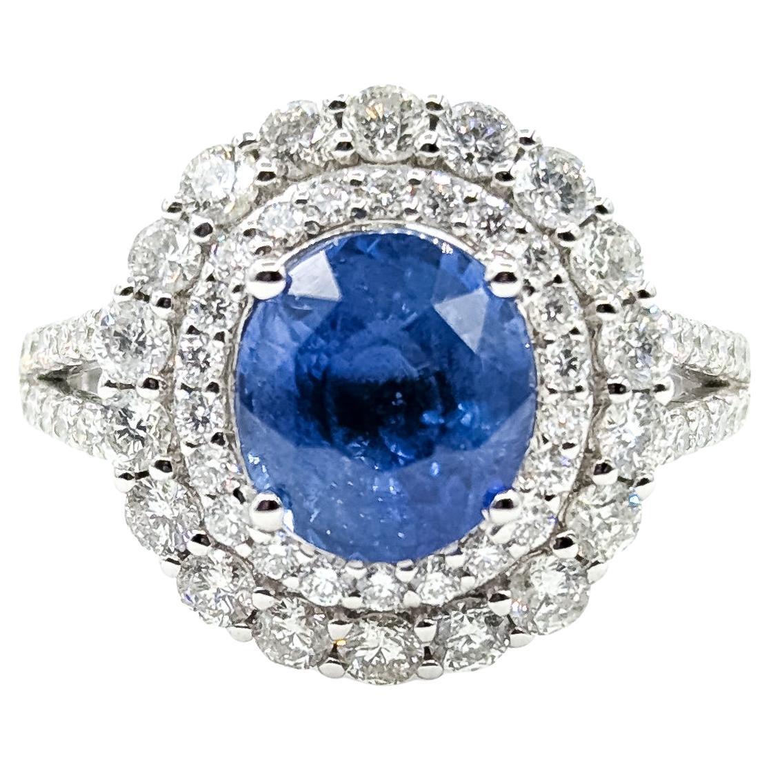 Anello con zaffiro e diamante radiante in platino