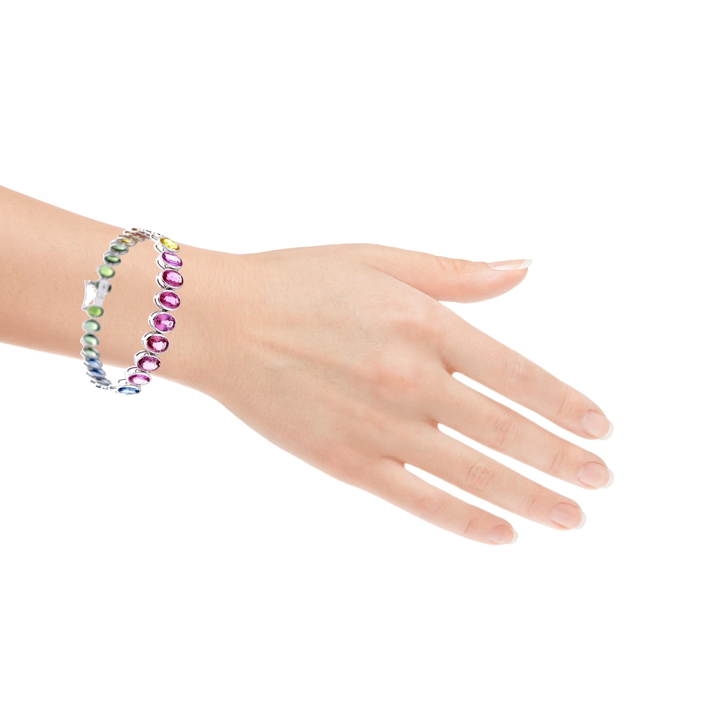 Descubre un estallido de color y elegancia con nuestra Pulsera Arco Iris Radiante de Piedras Multicolores.