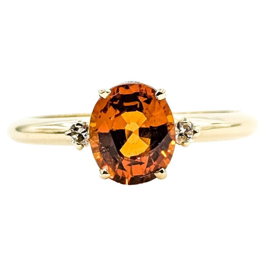 Radiant Spessartine Garnet 
Diamond Solitaire Ring in 14k Yellow Gold