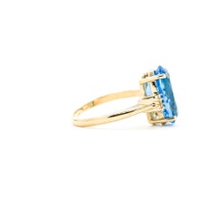 Anello con topazio radiante e diamanti in oro giallo 14k