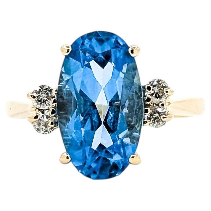 Radiant Topaz & Diamond Ring in 14k yellow gold