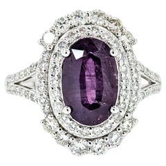 Anello con zaffiro non riscaldato e diamante in platino