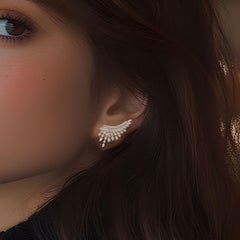 Pendientes de oro amarillo de 18 quilates en forma de ala radiante