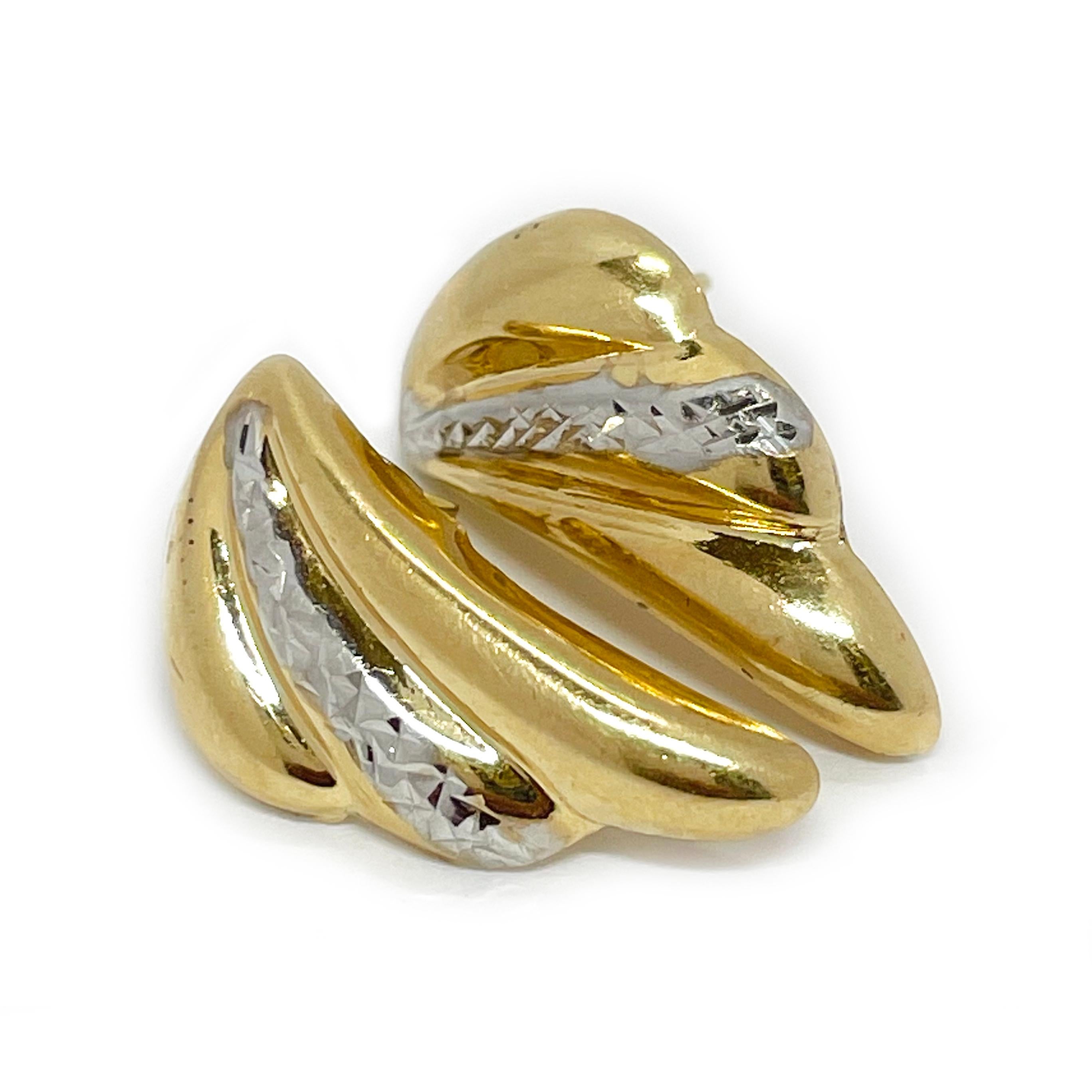 These 14K Yellow Gold Diamond-Cut Design Scalloped Earrings showcase a stunning blend of elegance and craftsmanship. Designed with three gracefully domed scallops—two in radiant yellow gold and a shimmering white gold accent in the center—they