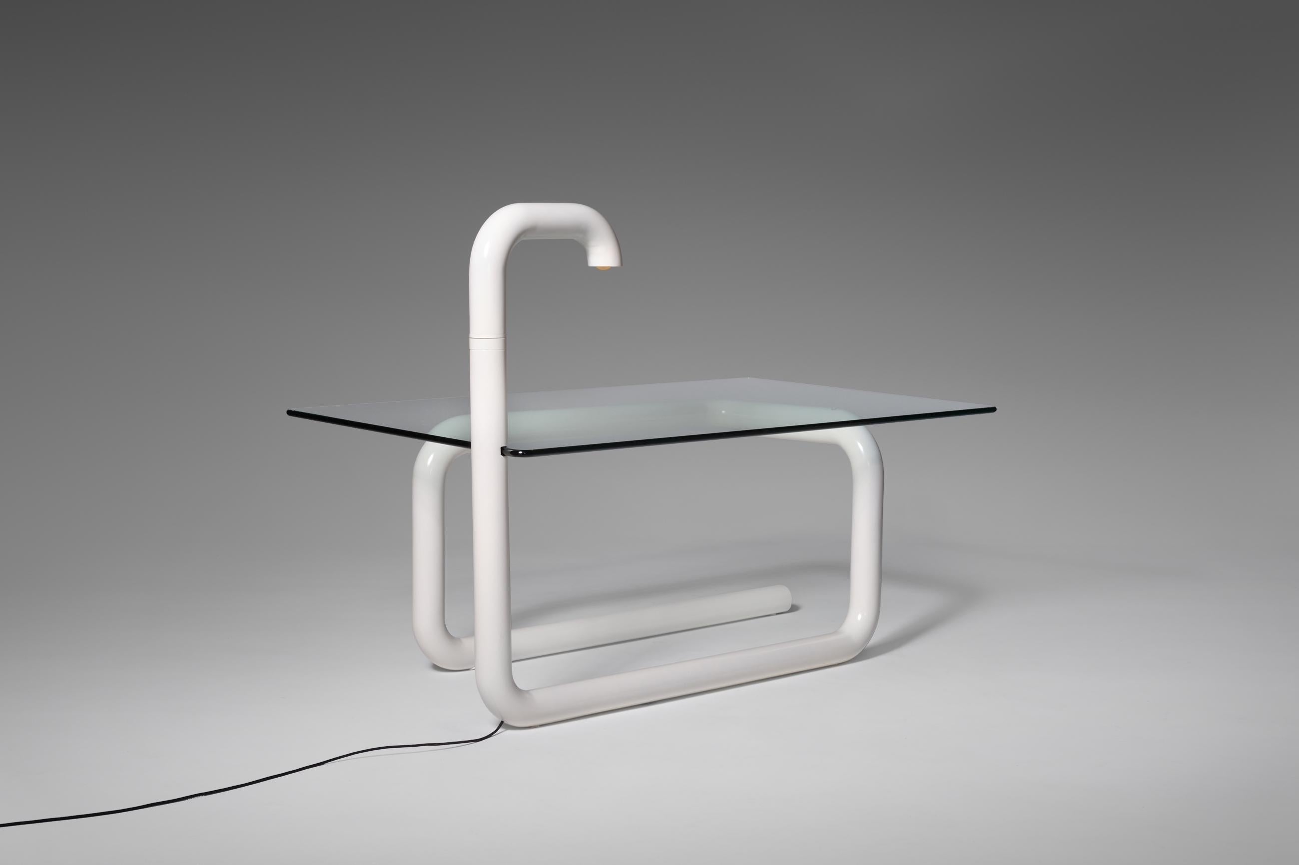 Radical Italian tubular desk, 1960s. The desk is designed in commission for a unique villa on Sicicily, see black and white photo from the original setting. The desk is made from one big continuous metal tube which is finished in an off white