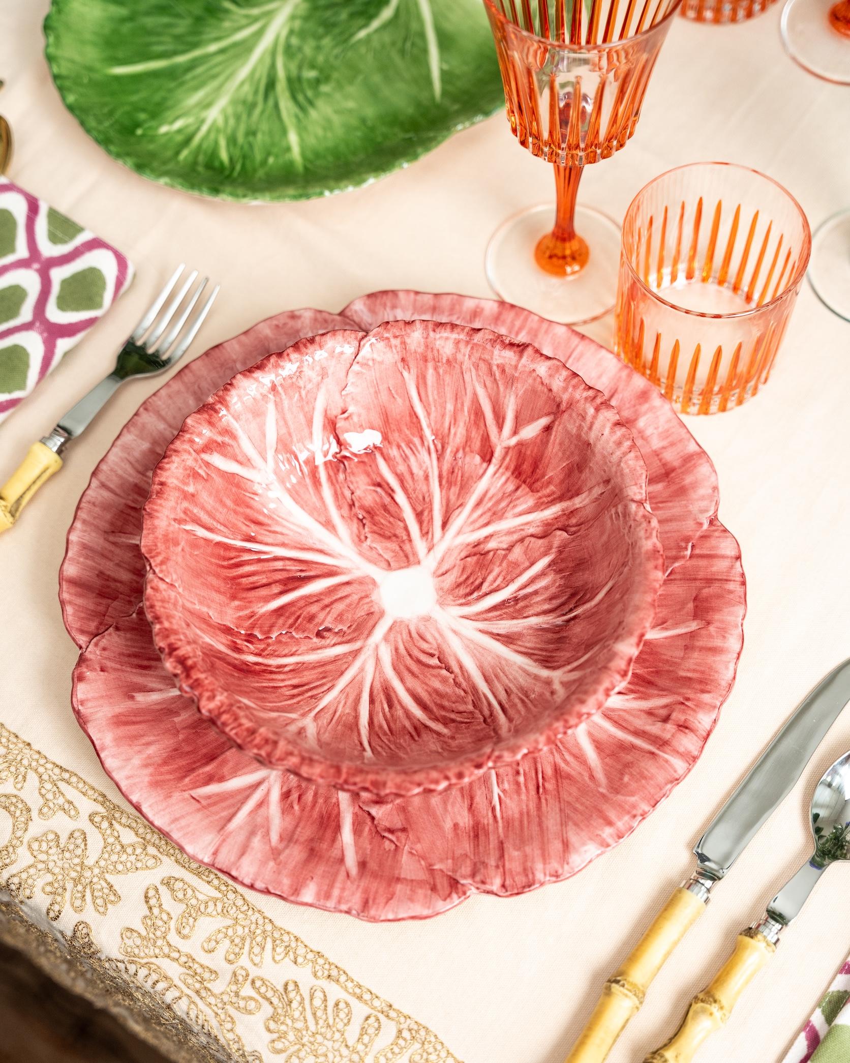 Bring the beauty of the garden to your home with our hand-painted radicchio-style salad bowl in a pink hue. Perfect for tableware, this salad bowl adds a touch of natural elegance and artistic charm to any space. 

100% Ceramic
Handmade and