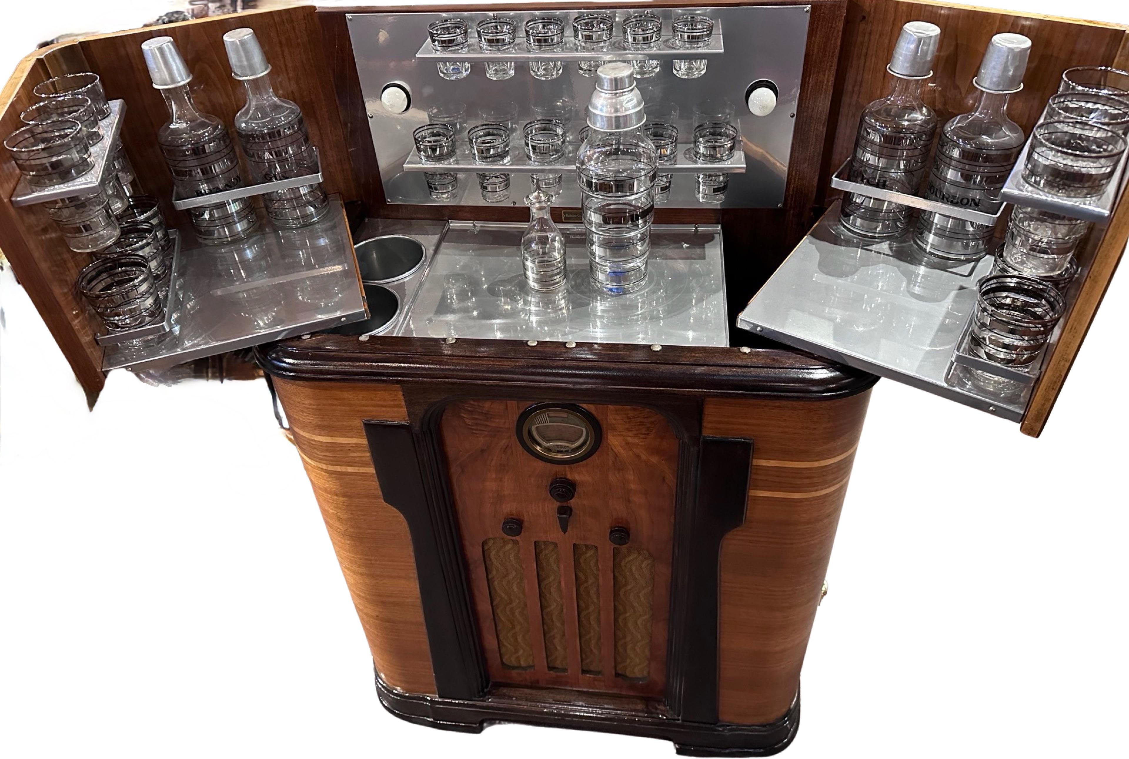 This spectacular Art Deco Philco Radio Bar is one of the most highly sought-after pieces by radio and bar enthusiasts alike. Created originally during the Prohibition Era – a time of fascination with hidden and secret liquor bars, it reached a high