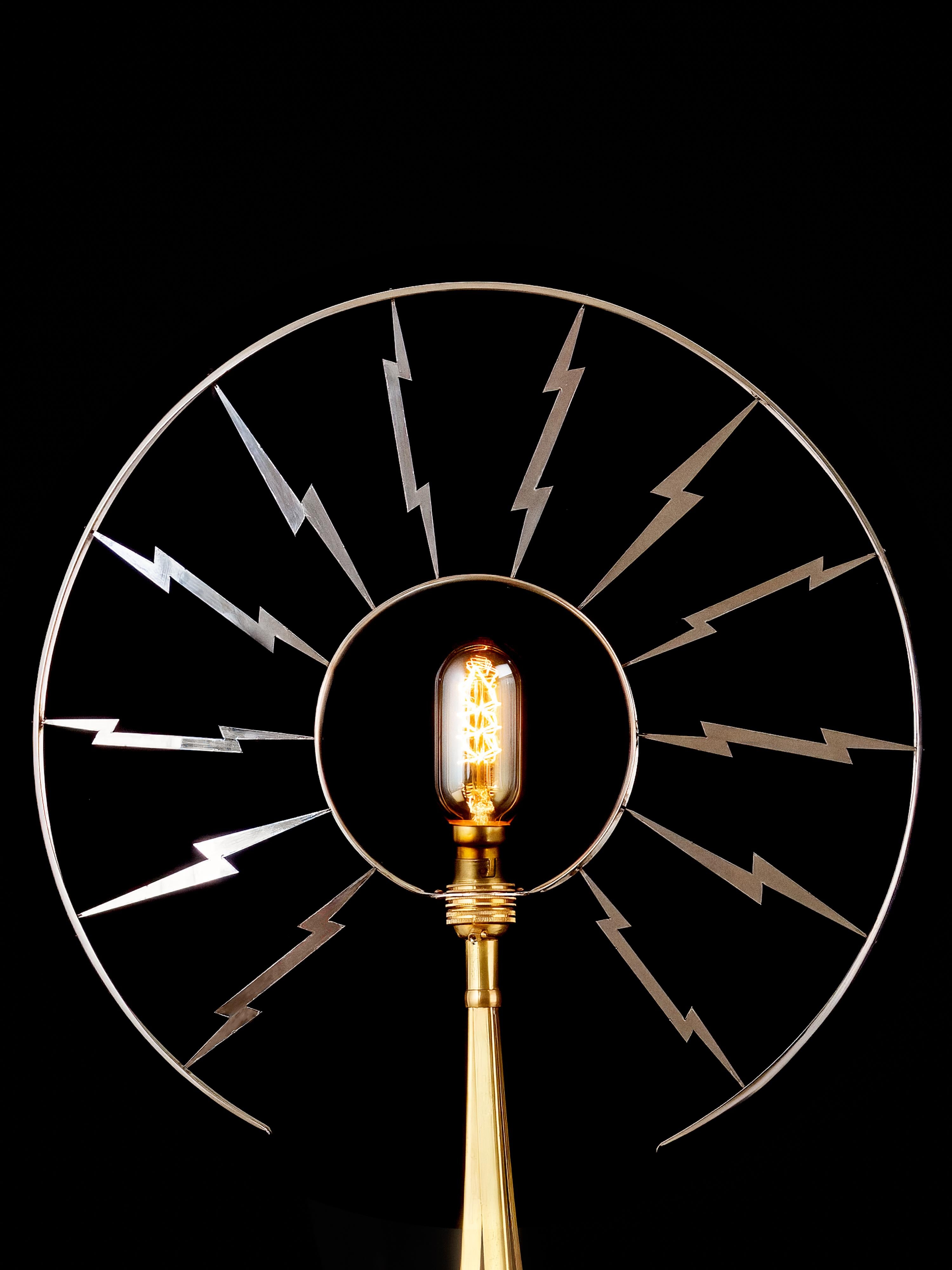Sam Rush is a UK, Bristol based designer/creator and especially likes this piece. Made of stainless steel and brass it captures the monochrome feel of the  black and white movie studios to which it is a salute .

Sam is trained in metal sculpture