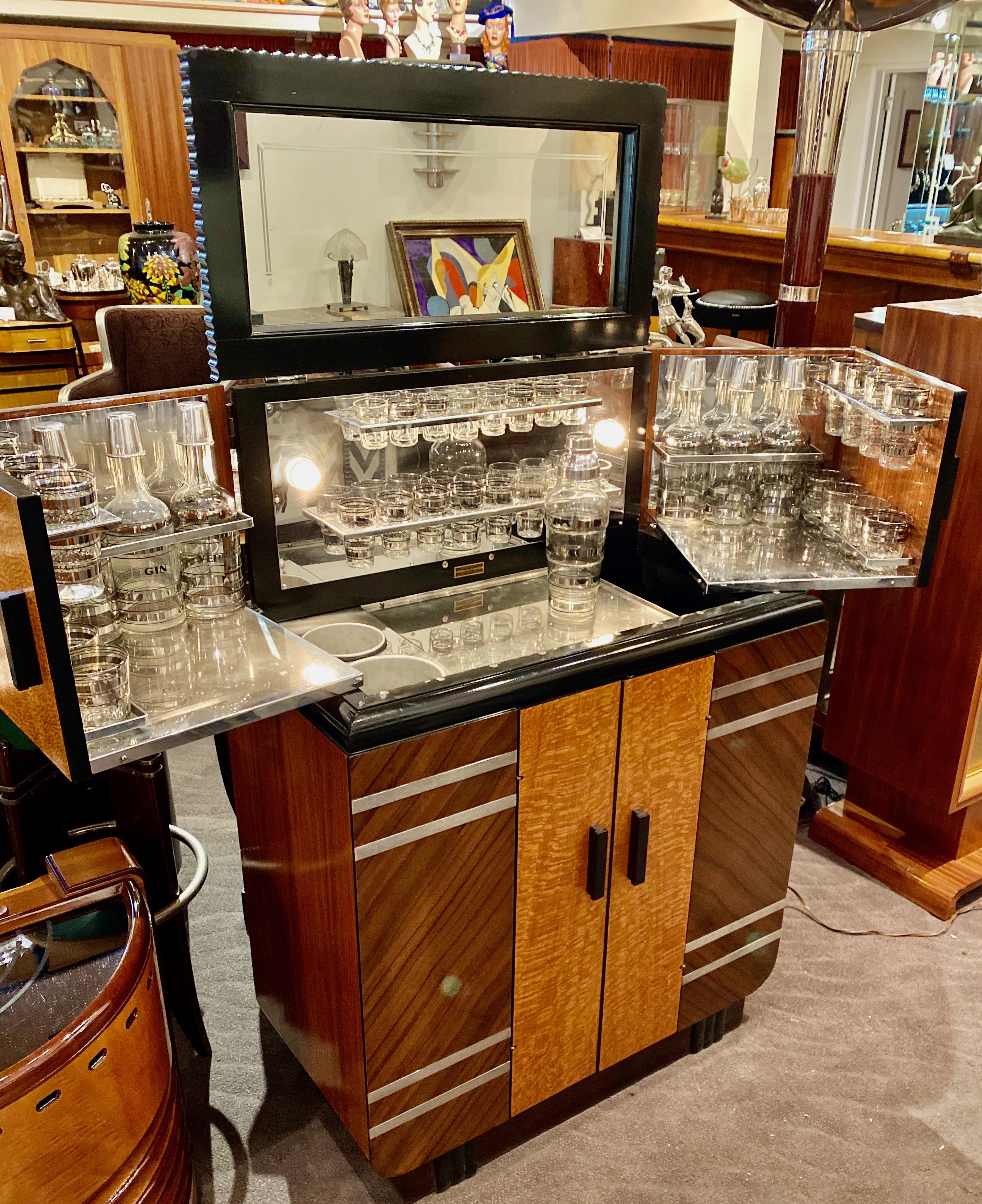 Art Deco Philco Radio Bar, one of the most highly sought after pieces by radio and bar enthusiasts alike. Created originally during the Prohibition Era, a time of fascination with hidden and secret liquor bars, it reached a high point with its 1936