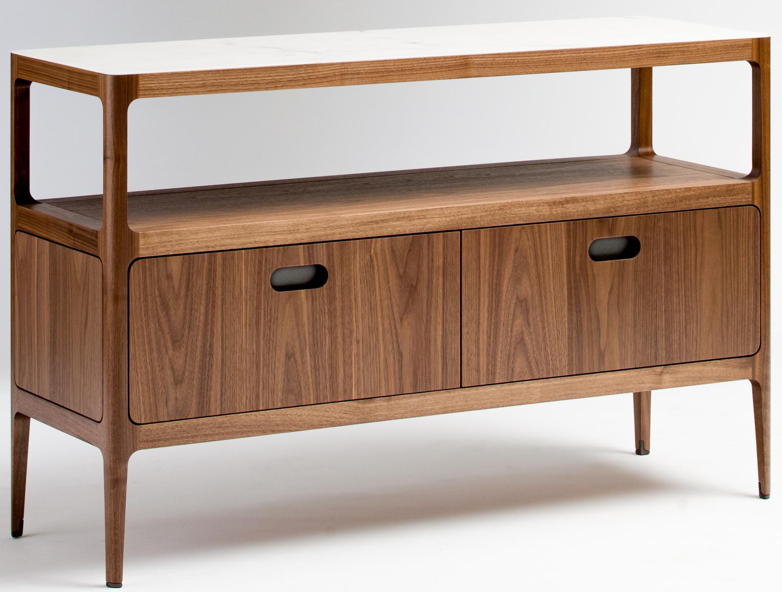 This credenza or sideboard designed and fabricated by Munson Furniture draws inspiration from mid-century designs and fits beautifully with both traditional and contemporary interiors. As shown, it has two 10 inch drawer faces. The shelf height is 8
