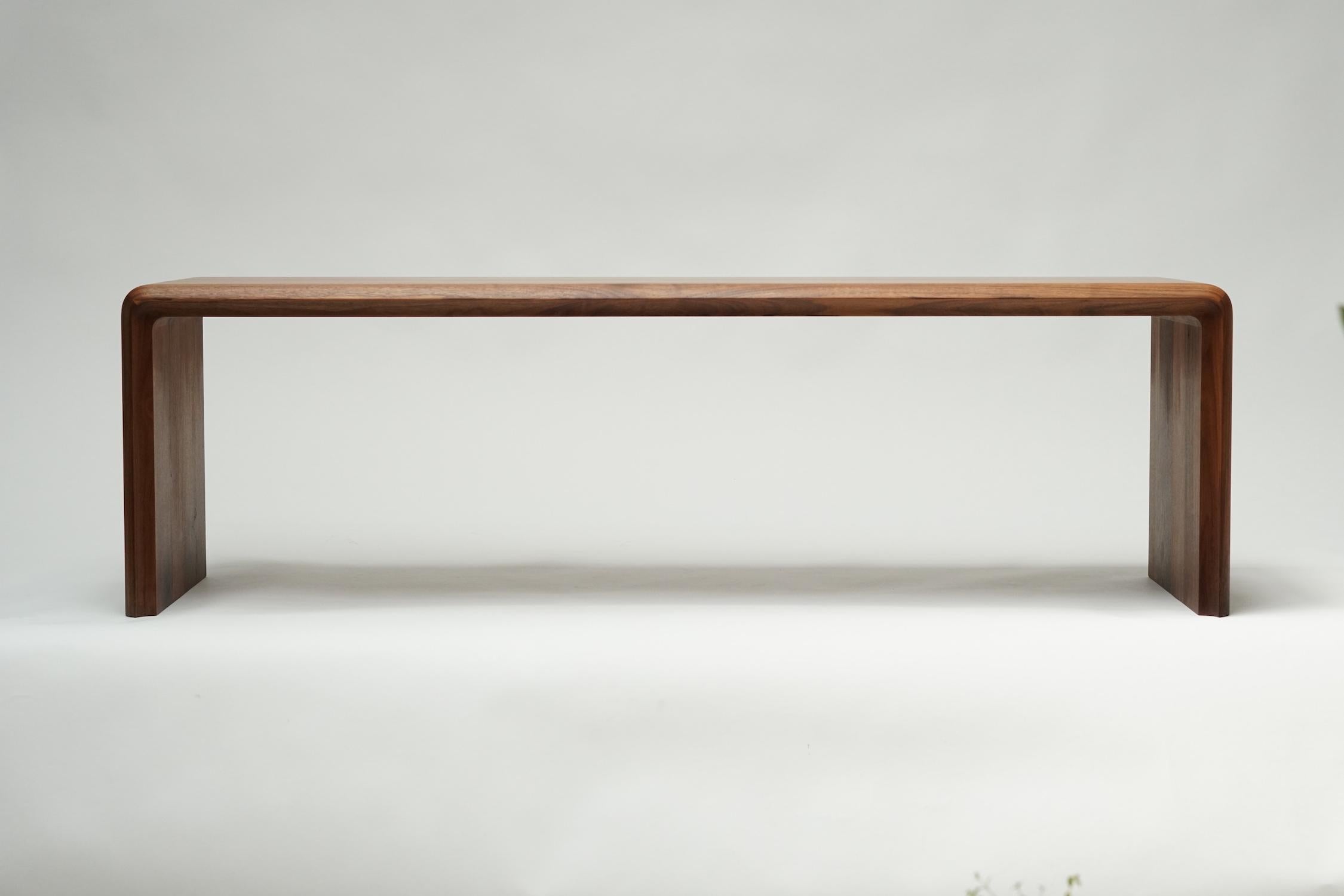 Hand-Crafted Radius Cutaway Walnut Bench For Sale