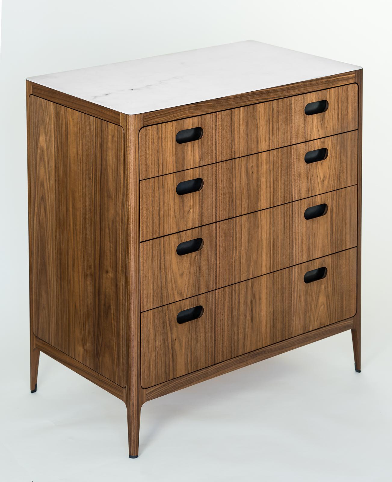 This customizable walnut dresser from the Munson Furniture Radius collection draws inspiration from mid-century designs and fits beautifully with both traditional and contemporary interiors. Overall dimensions as well as the height and number of
