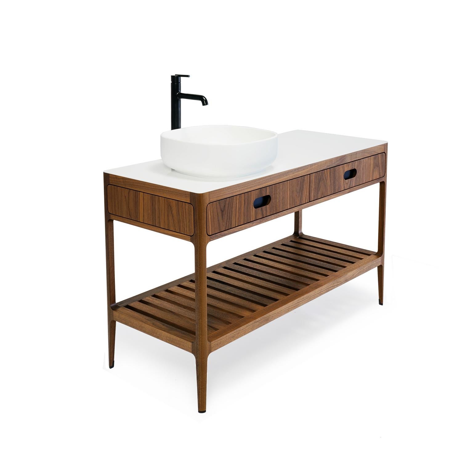 This freestanding bathroom vanity designed and fabricated by Munson Furniture draws inspiration from midcentury designs and fits beautifully with both traditional and contemporary interiors. The dimensions and functionality can all be customized to