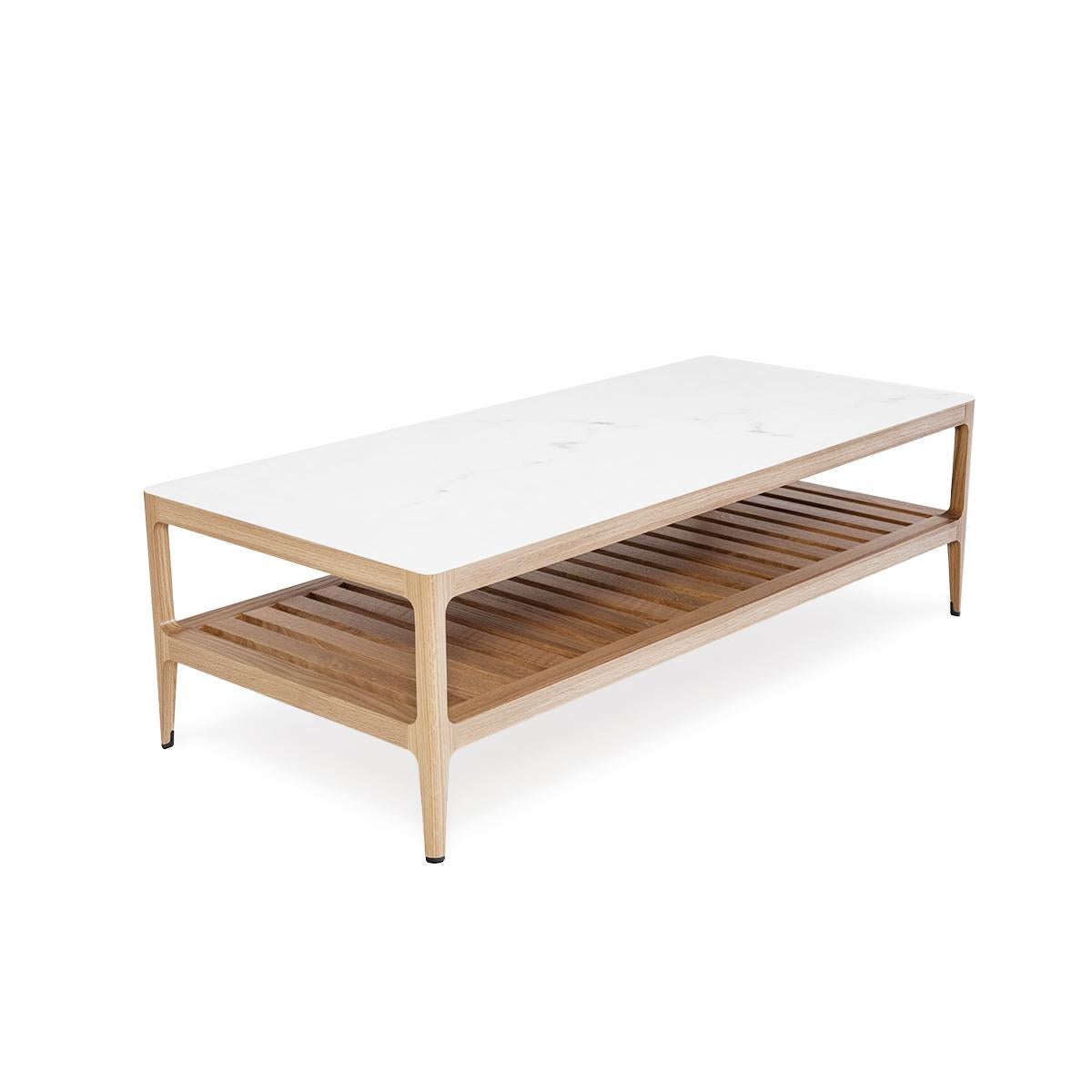 The Radius oak coffee table from Munson Furniture draws inspiration from midcentury designs and fits beautifully with both traditional and contemporary interiors fits. The table can be customized in dimensions to fit your particular space and