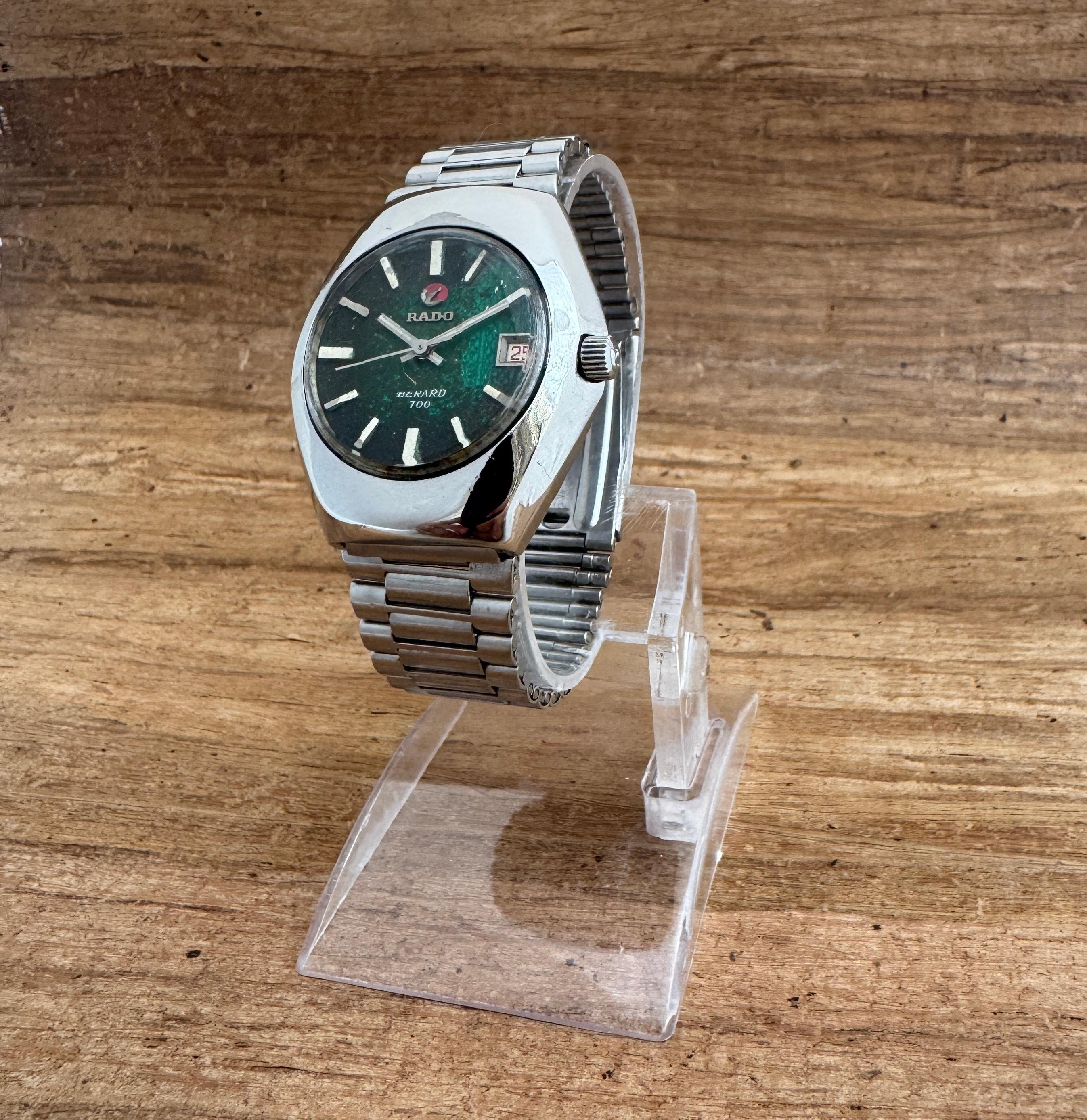  Description
Brand: RADO

Model: Berard 700

Country Of Manufacture: Switzerland

Movement: Automatic

Case Material: Stainless steel

Measurements : Case width: 36 mm. (without crown) x 40 mm

Band Type : Stainless steel

Band Condition : Used In