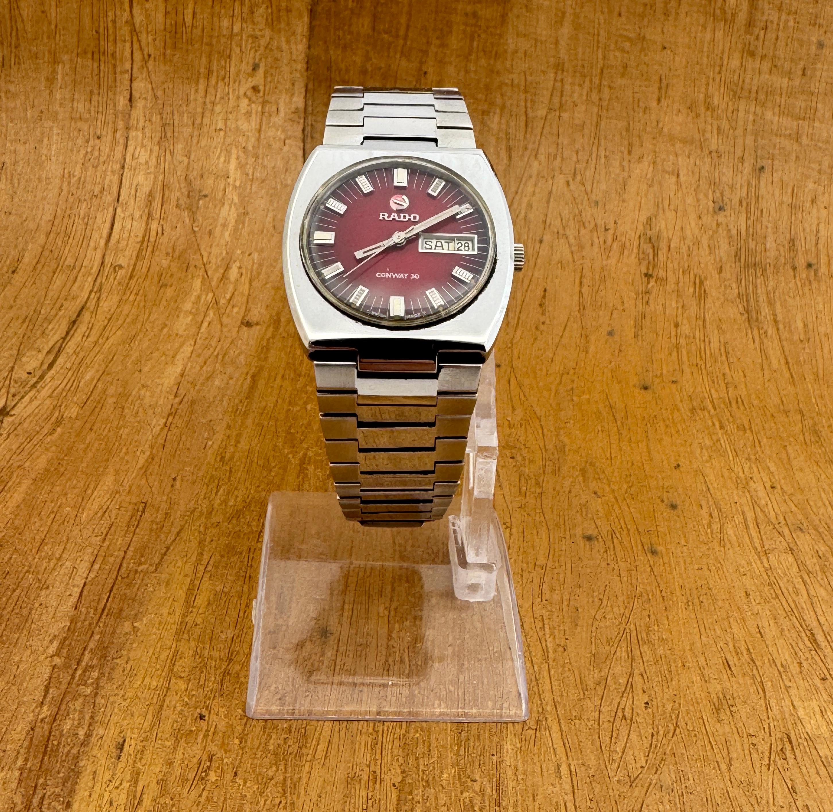  Description
Brand : Rado

Model: CONWAY 30

Country Of Manufacture: Switzerland

Movement: Automatic

Case Material: Stainless Steel

Measurements :36mm diameter (excluding crown )

Band Type : After Market Stainless Steel

Band Condition :In Used