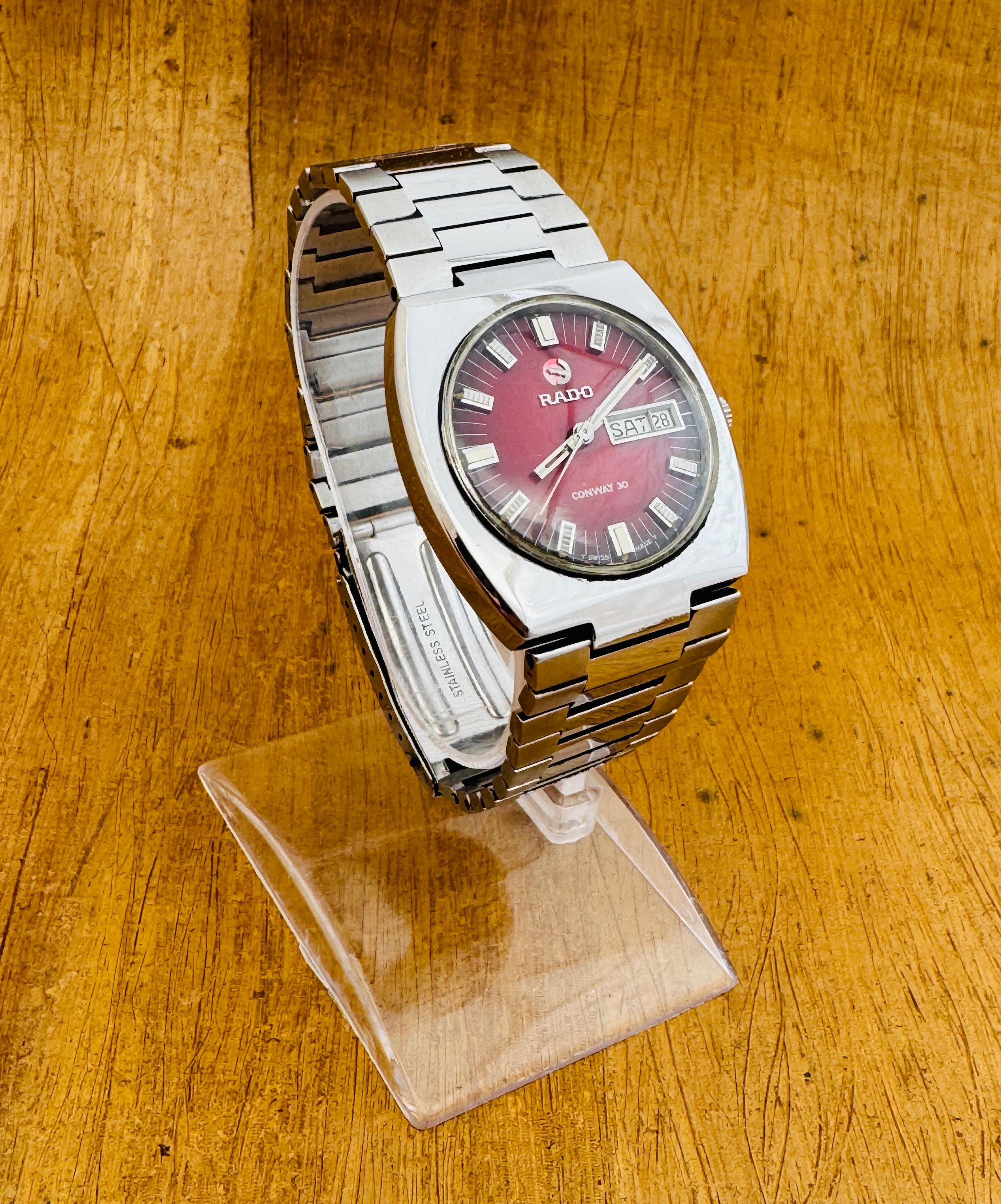 Rado CONWAY 30 watch Automatic Rare Red Dial Day / Date Stainless Steel Watch In Good Condition For Sale In Toronto, CA