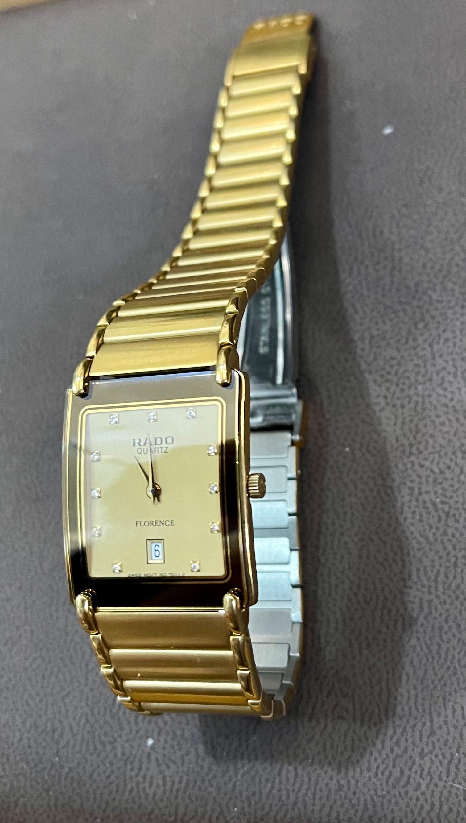 It is very hard to take pictures , watch is much nicer then it shows in the pictures
Matching female watch is available.
If you buy both watches they will come in a box of Rado.
Gold-tone stainless steel case with a gold-tone stainless steel
