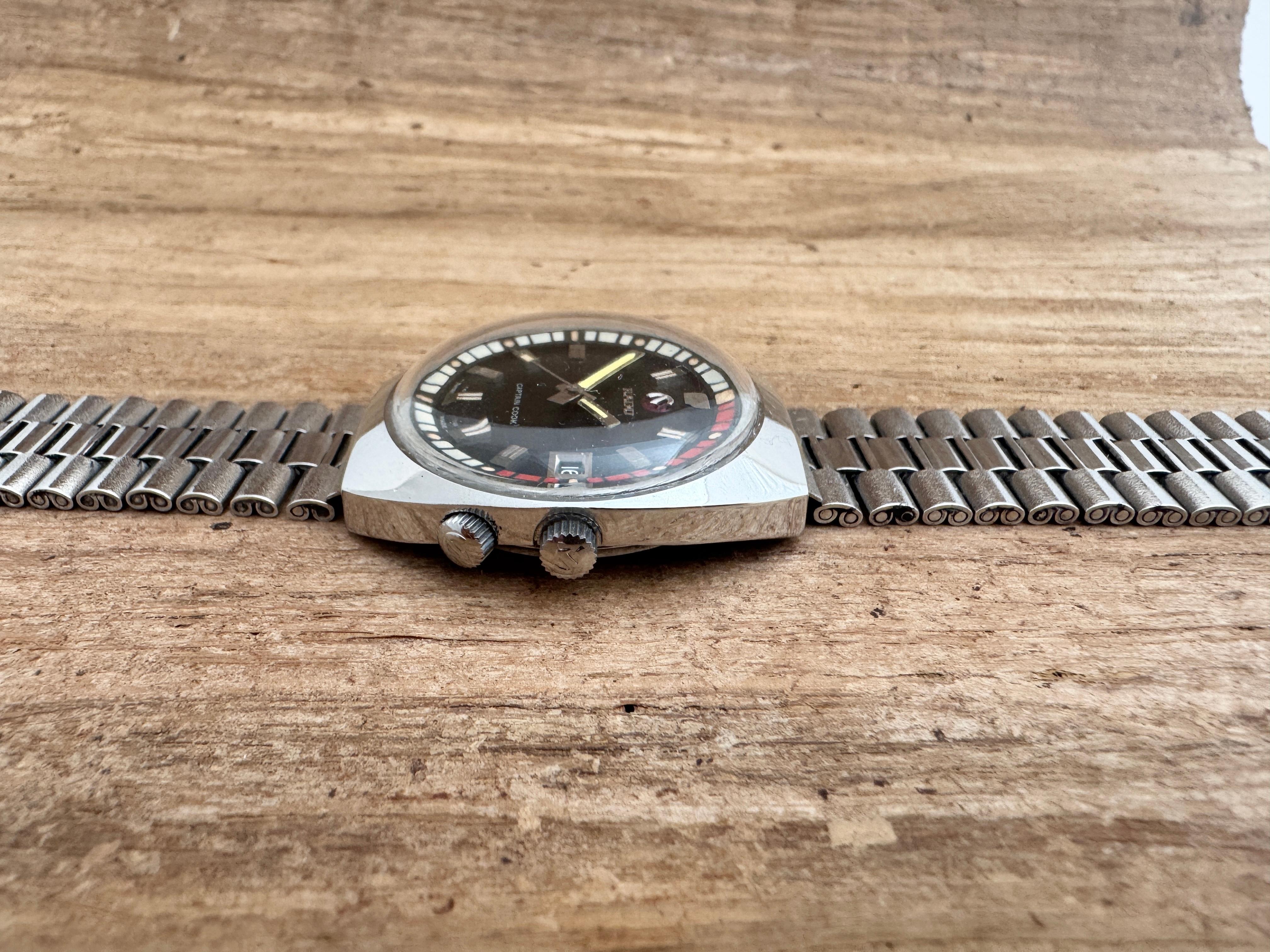   Description
Brand : Rado

Model: Captain Cook

Reference Number : 11773/2

Country Of Manufacture: Switzerland

Movement: Automatic

Case Material: Stainless Steel

Measurements :37mm diameter (excluding crown ) x 41mm

Band Type : Stainless Steel