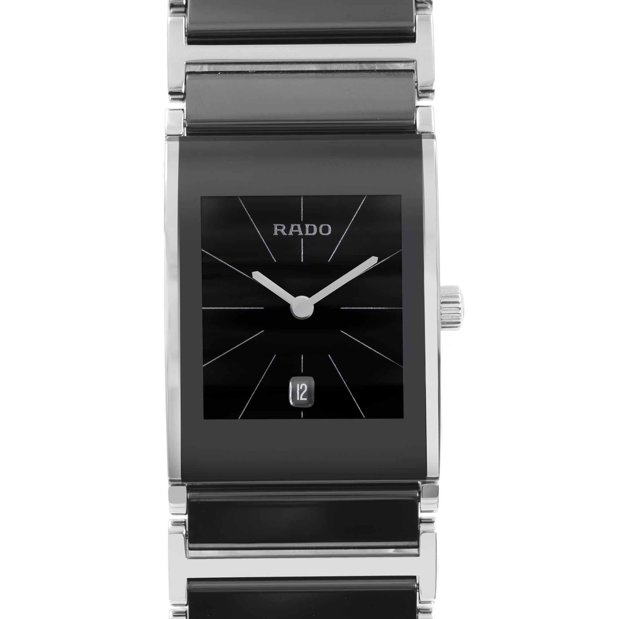 Unworn Rado Integral Quartz Ladies Watch R20785152. This Beautiful Ladies Timepiece Is Powered by a Quartz (Battery) Movement and Features: Silvers-Tone Stainless Steel Case With a Stainless Steel and Ceramic Bracelet. Black Dial with Silver-Tone