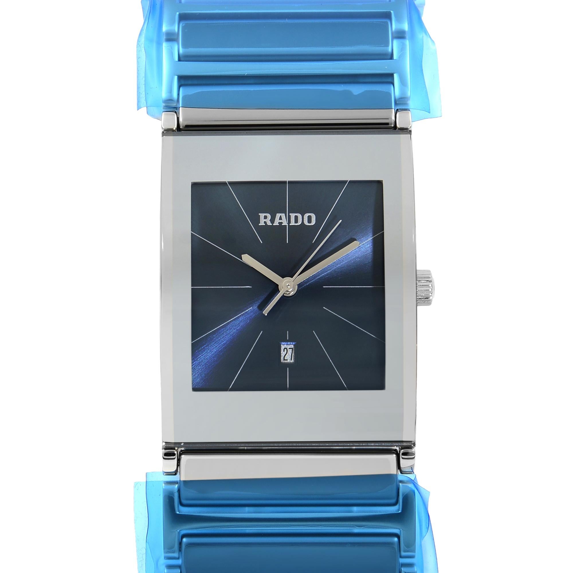 This brand new Rado Integral R20745202 is a beautiful men's timepiece that is powered by a quartz movement which is cased in a stainless steel case. It has a  rectangle shape face, date dial, and has hand sticks style markers. It is completed with a