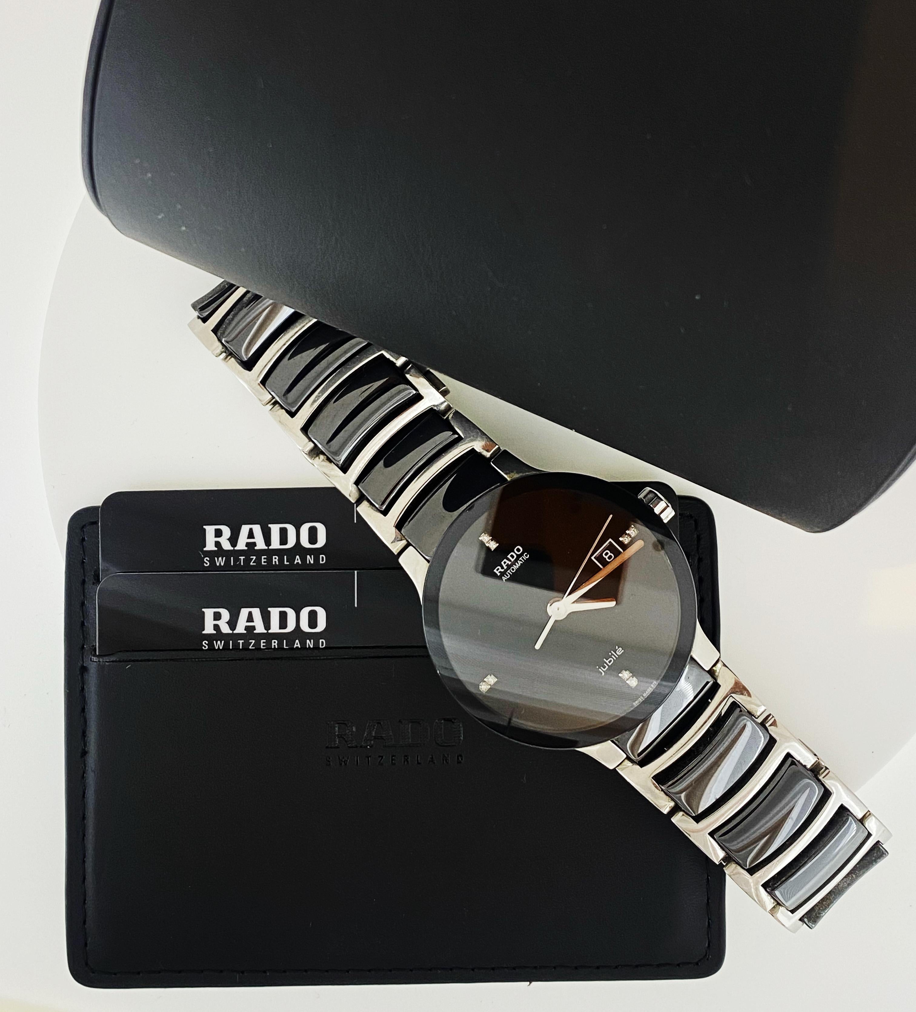 Performed in Stainless Steel & elegant Black Ceramic,
this sophisticated timepiece 
by Swiss luxury watch brand RADO 
(ref 01.658.0941.3.070)
is in beautiful condition & in excellent working order

It comes in a full set: original outer box, papers,