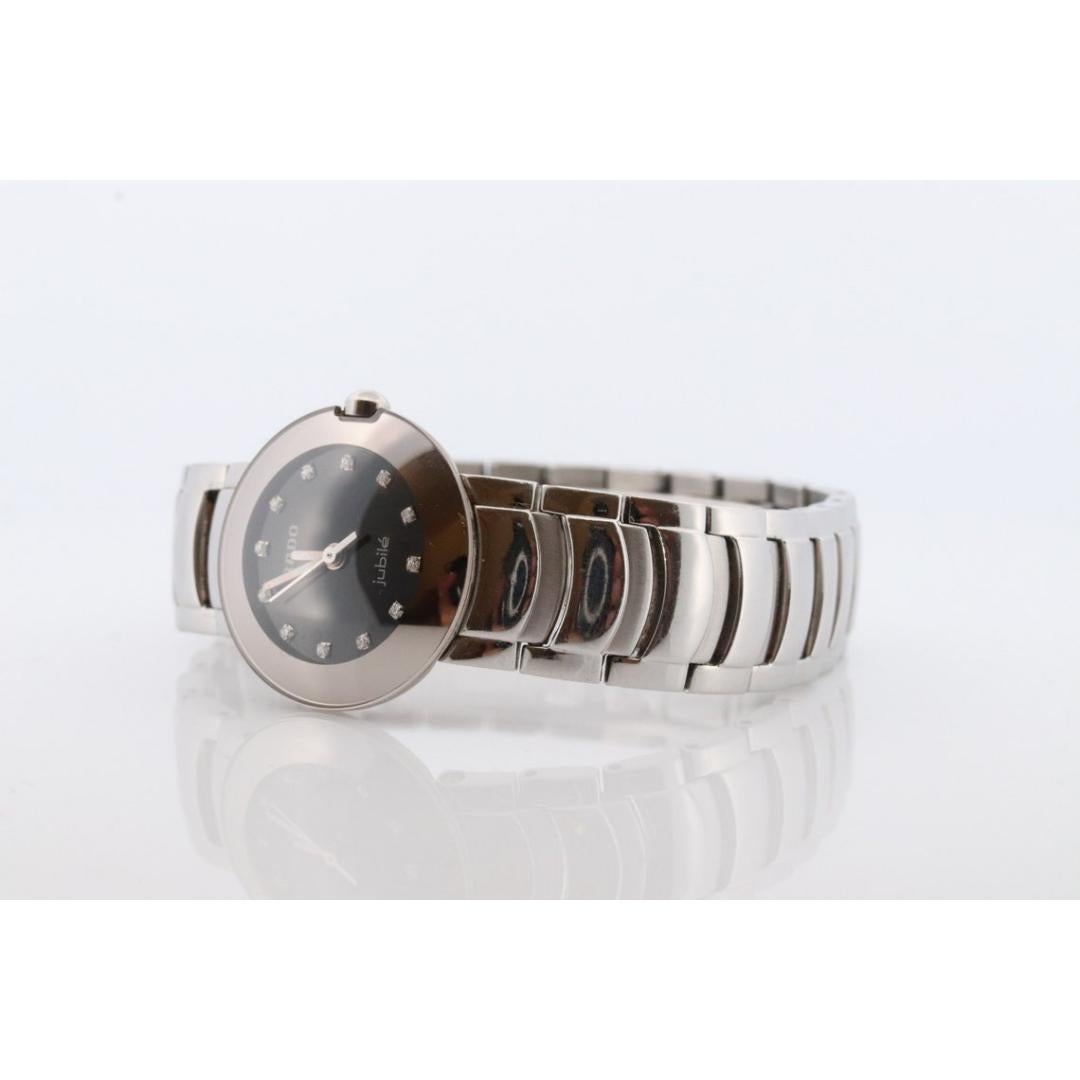Vintage By
MATERIAL des Bandes: Leder, Silber
MATERIALIEN: Silber
Stromversorgung: Batterie

Ablesung: Analog

RADO Damen DiaStar Jubile Diamant-Edelstahl-Armbanduhr.

Das Gesicht ist mit winzigen Diamanten verziert.


Referenz 318.0549.3

Original,