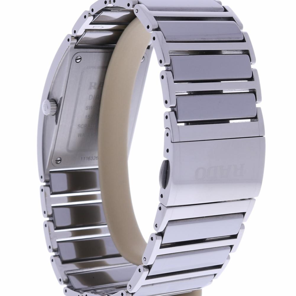 Rado Jubile Reference #:R20757752. Black ceramic and stainless steel case with a stainless steel bracelet. Stainless steel diamond bezel. Black dial with silver-tone hands. Diamonds mark the 2,3,4,8,9 and 10 o'clock positions. Dial Type: Analog.